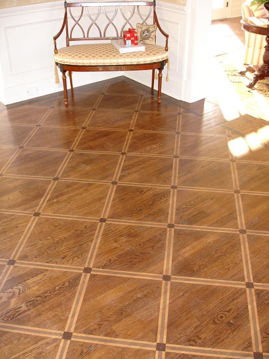 How to Paint a Faux Rug With a Stenciled Pattern on a Hardwood Floor