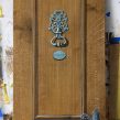 Faux painted wood grained door and trompe loeil molding and handle mjpfaux.com mjp studio CT NY